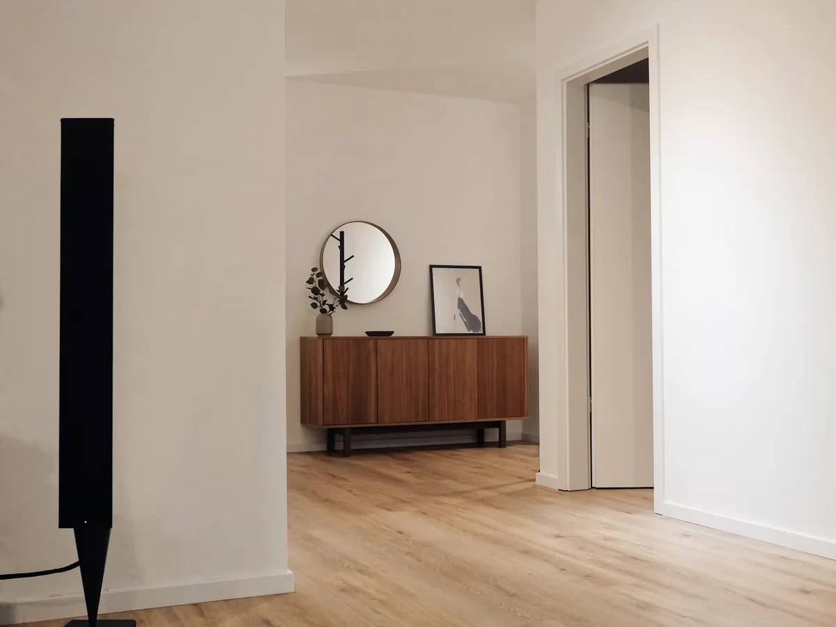 Freshly renovated apartment interior with clean walls and newly laid floor